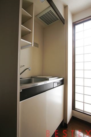 サンパレス西片 303
